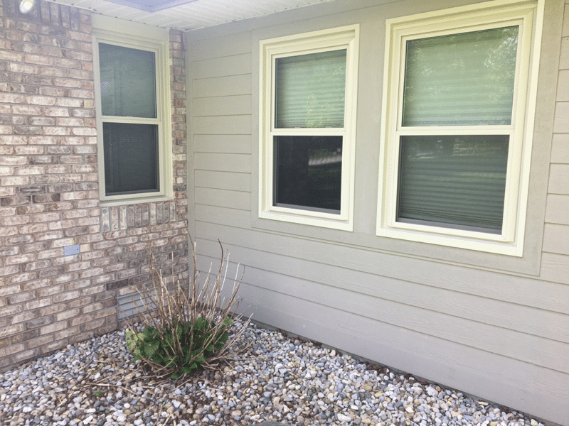 Three double hung windows with no grids.